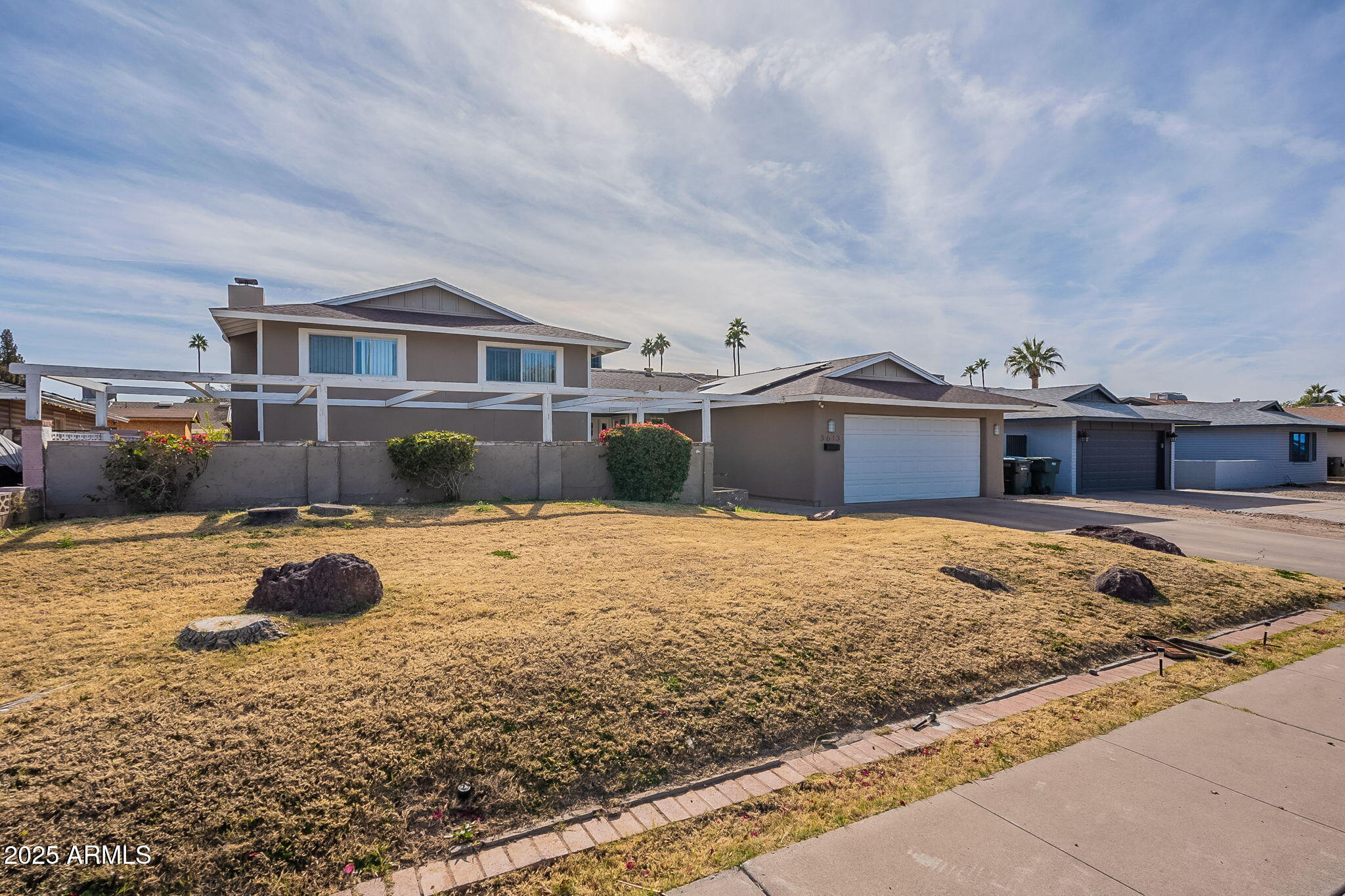3613 W Port Au Prince Lane