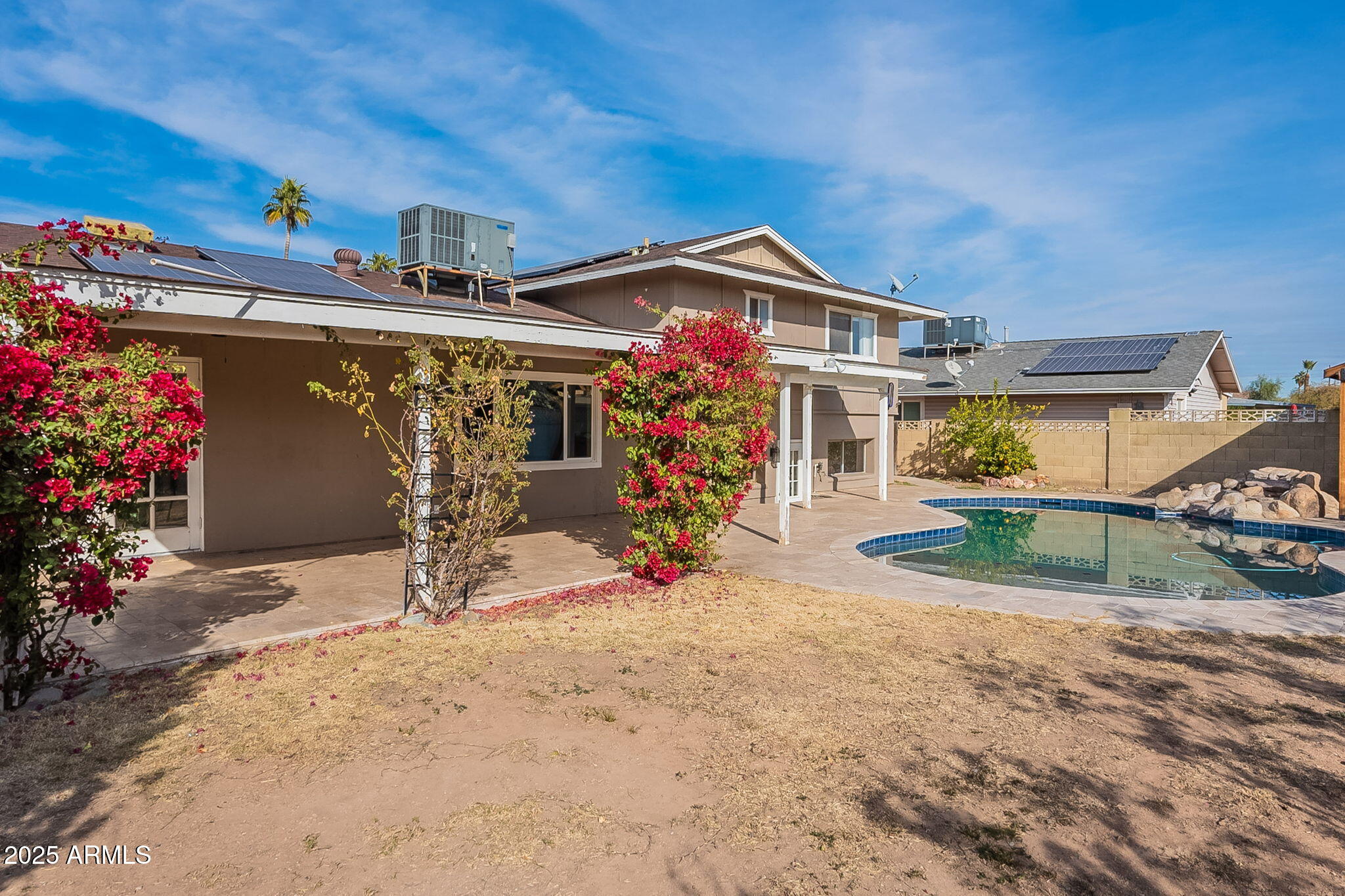 3613 W Port Au Prince Lane