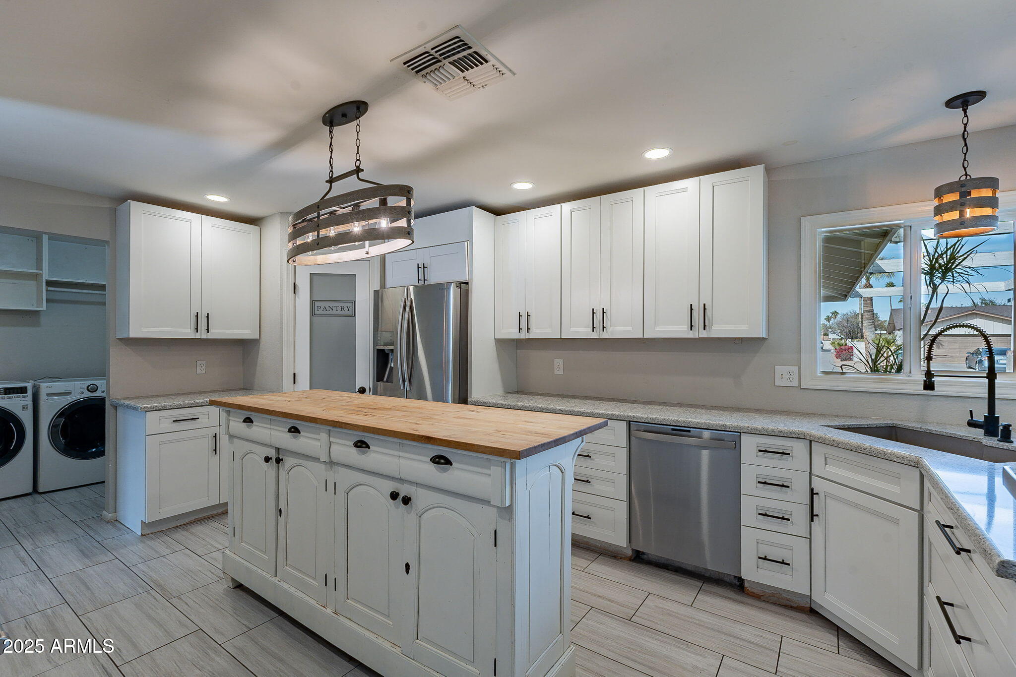 3613 W Port Au Prince Lane