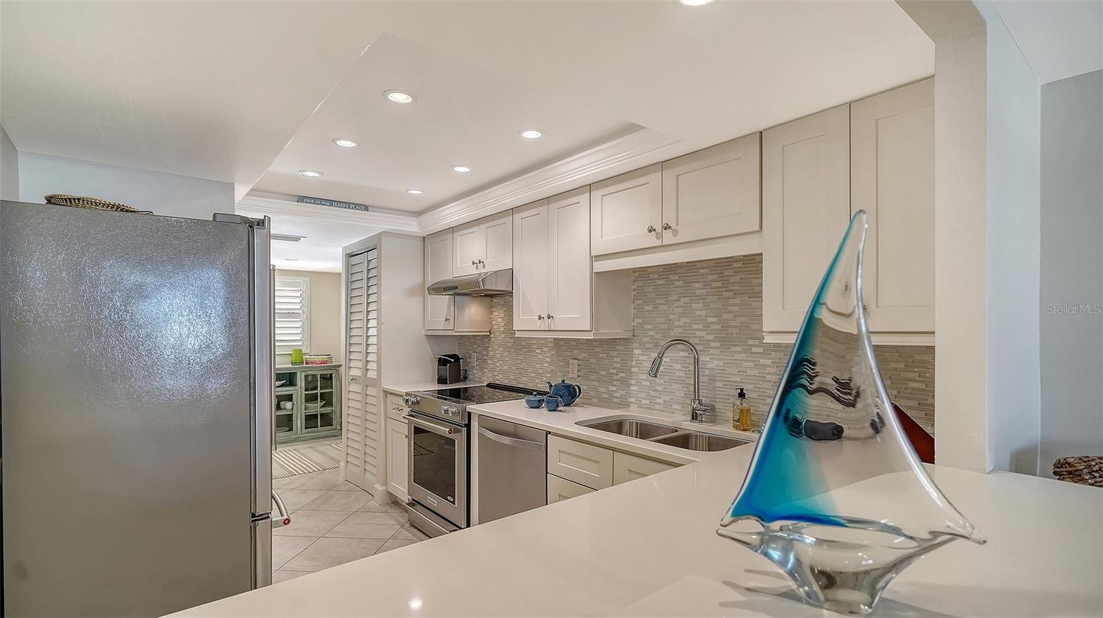 8773 MIDNIGHT PASS RD #204G