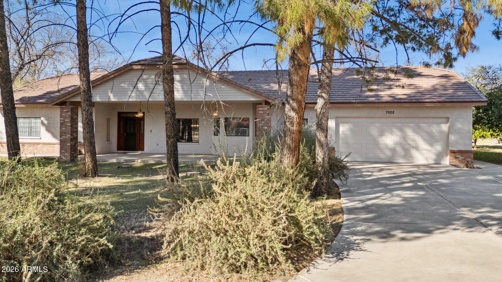 7002 W Surrey Avenue