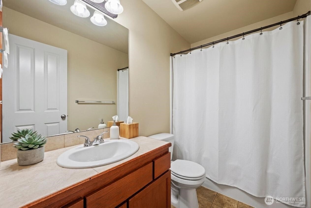 9237 11th Place NE Unit: A