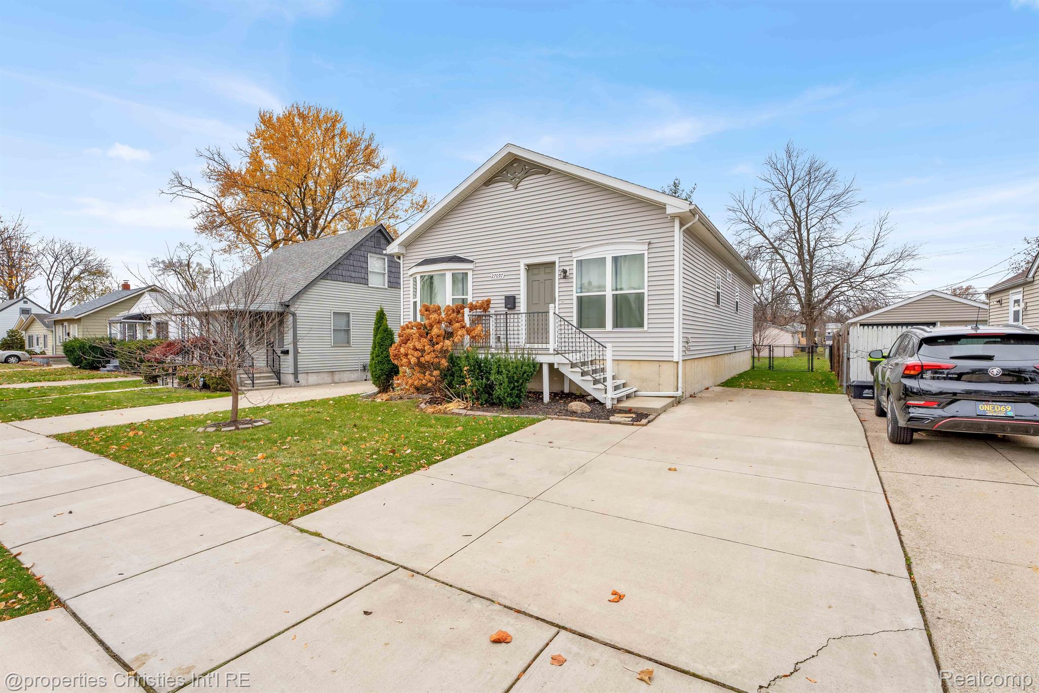 Front exterior in the 4-bedroom Colonial home for sale at 27097 Alger Boulevard, Madison Heights City, MI, listed by SK Group