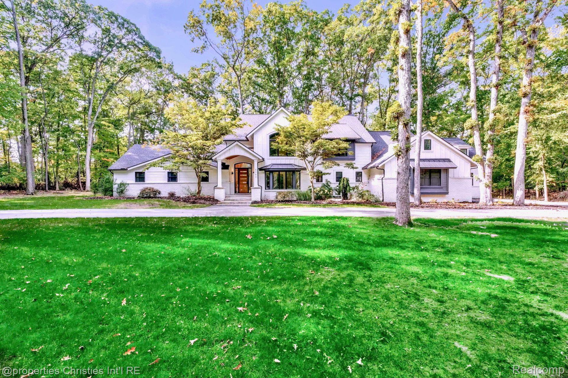 Front exterior in the 4-bedroom Colonial home for sale at 5080 Tootmoor Road, Bloomfield Charter Township, MI, listed by SK Group