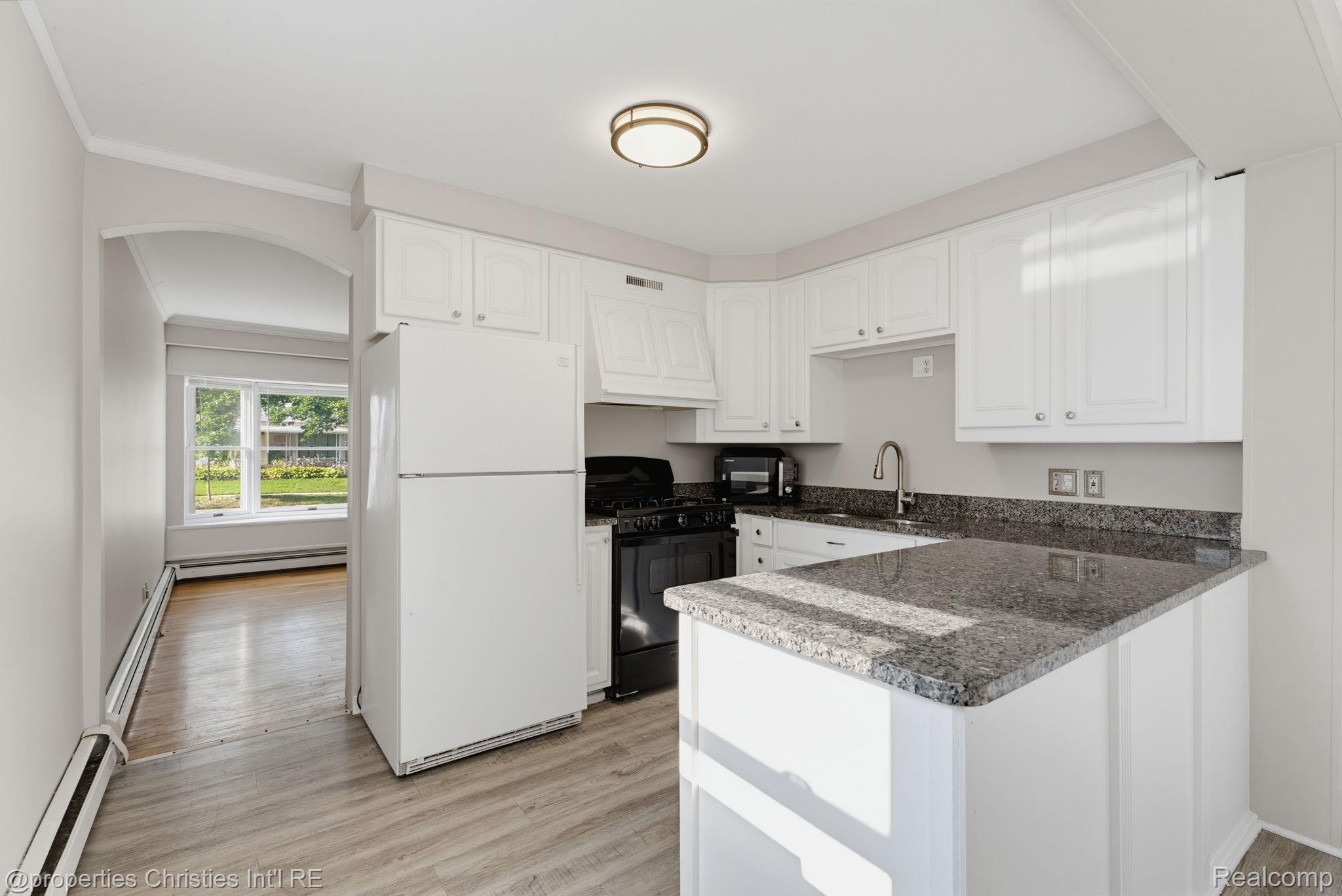 Kitchen in the 4-bedroom Colonial home for sale at 2424 Dallas Avenue, Royal Oak City, MI,