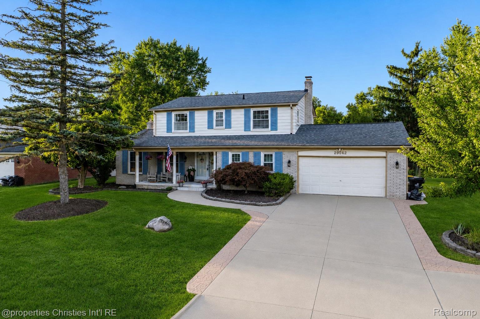 Front Exterior 4-bedroom Colonial home for sale at 29042 Raleigh Road, Farmington Hills, MI, listed by SK Group