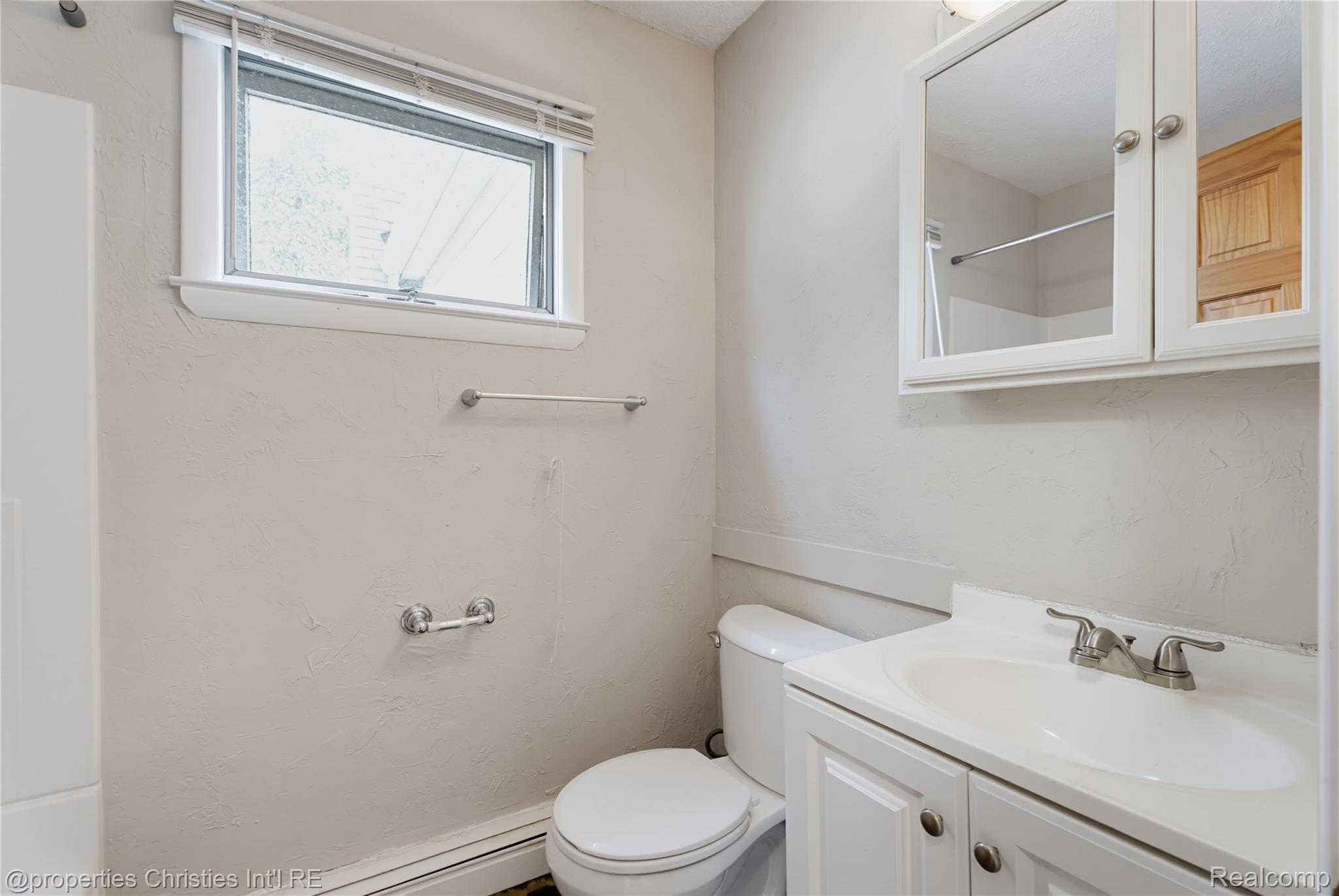 Bath Room  in the 4-bedroom colonial home for sale at 2424 Dallas Avenue, Royal Oak, MI, listed by SK Group