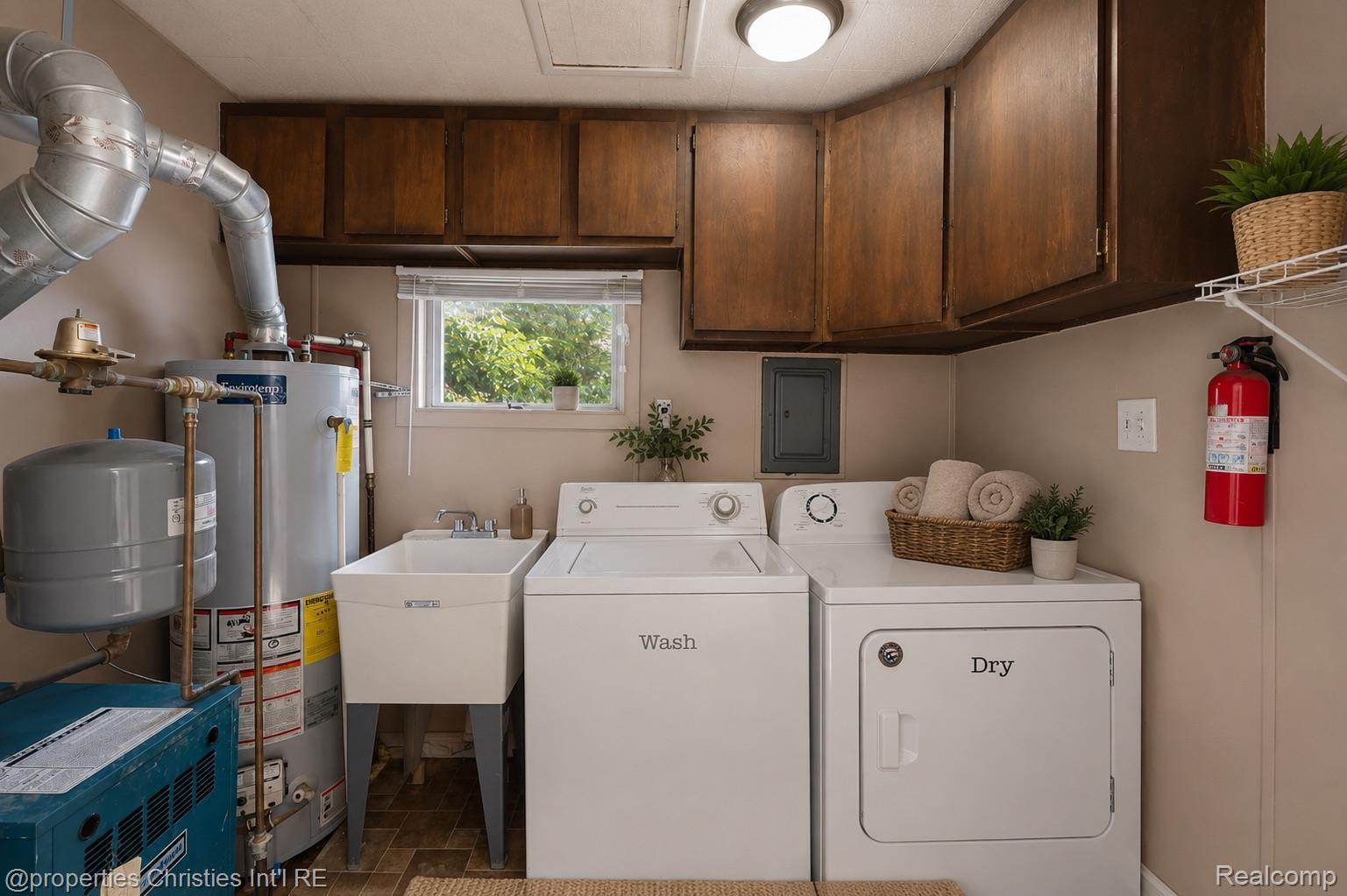 Laundry Area  in the 4-bedroom colonial home for sale at 2424 Dallas Avenue, Royal Oak, MI, listed by SK Group