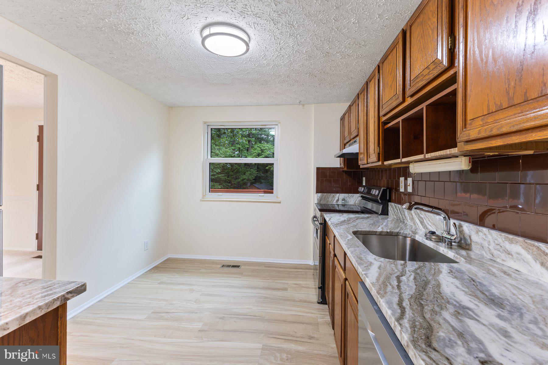 8011 TREASURE TREE COURT