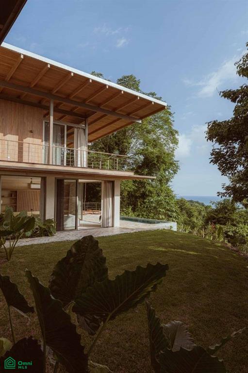 Designer Home With Ocean And Mountain Views