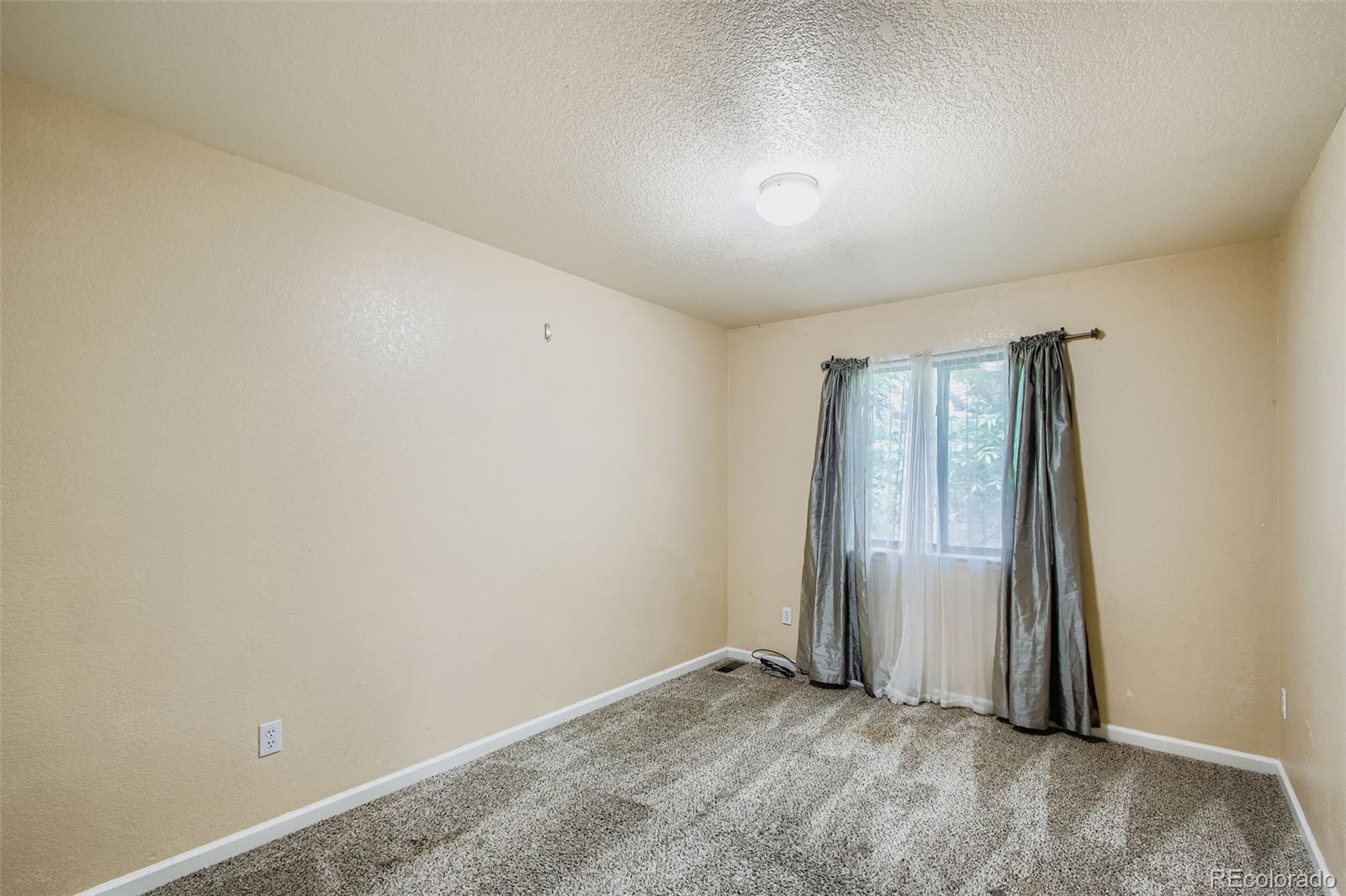 10693 W 63rd Drive Unit: 102