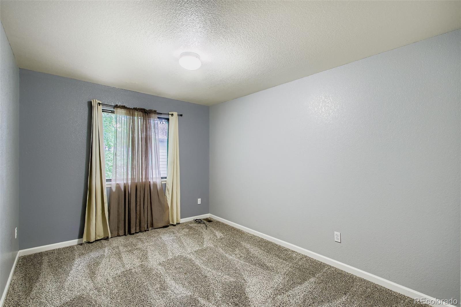 10693 W 63rd Drive Unit: 102