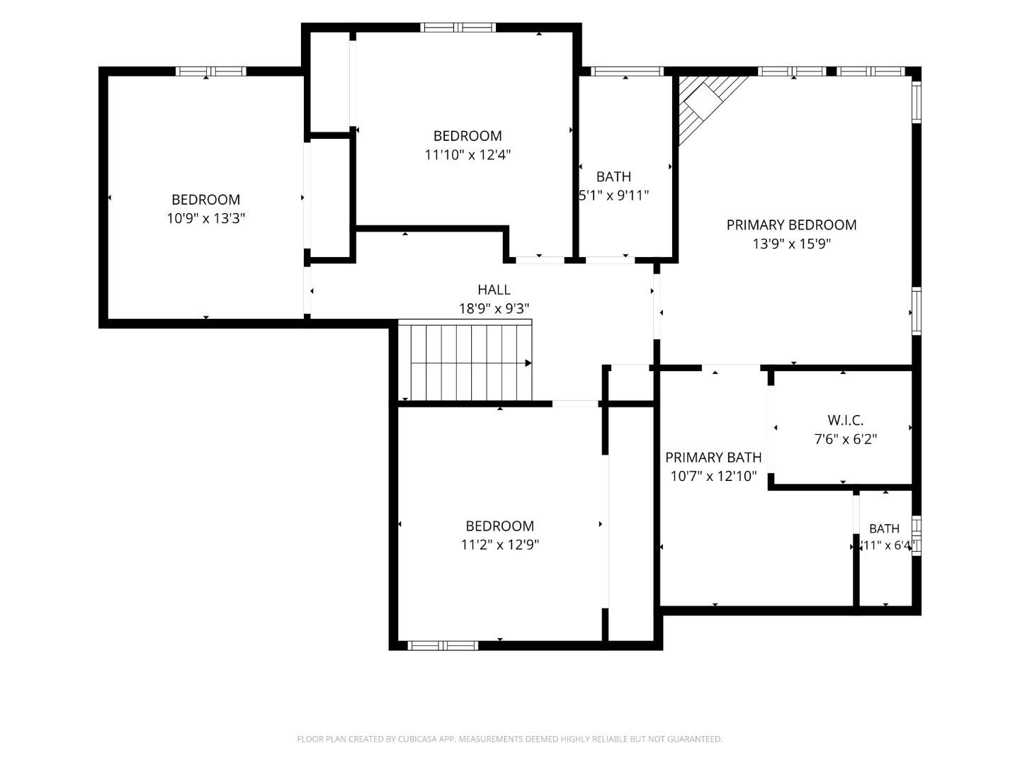 Floor plan showing four bedrooms, three bathrooms, a hall, stairs, and a walk-in closet.