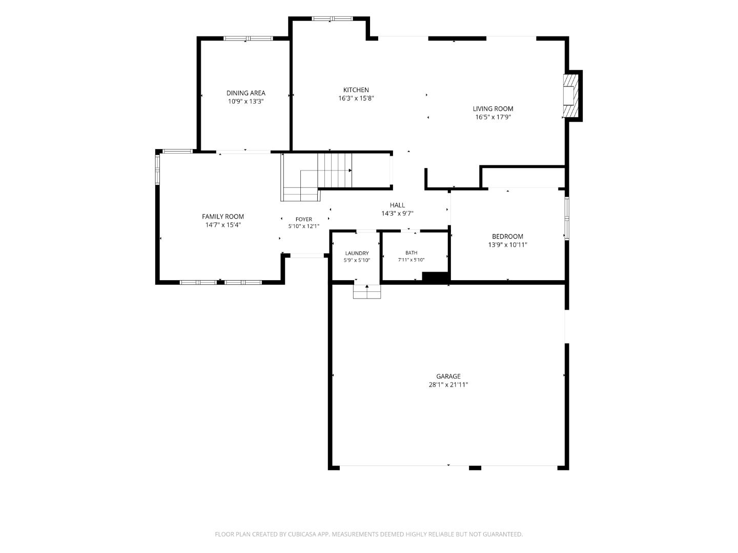 Floor plan showing the home’s kitchen, living and family rooms, bedroom, bathroom, laundry, and attached garage.