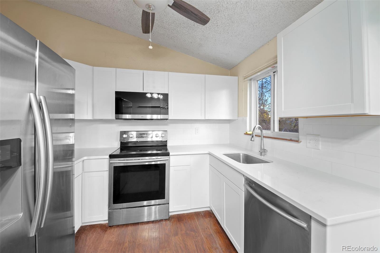 10966 W Bowles Place