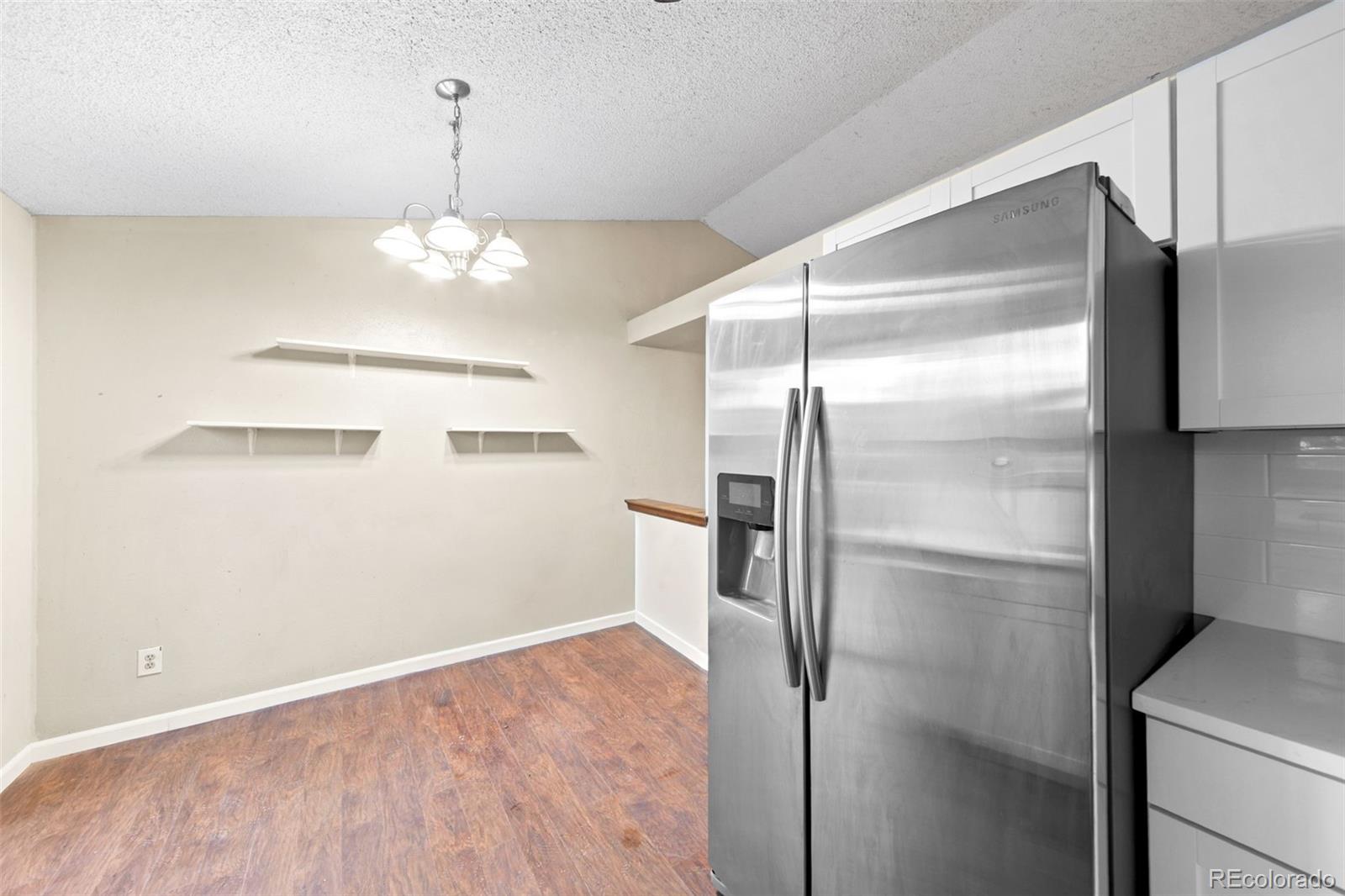 10966 W Bowles Place