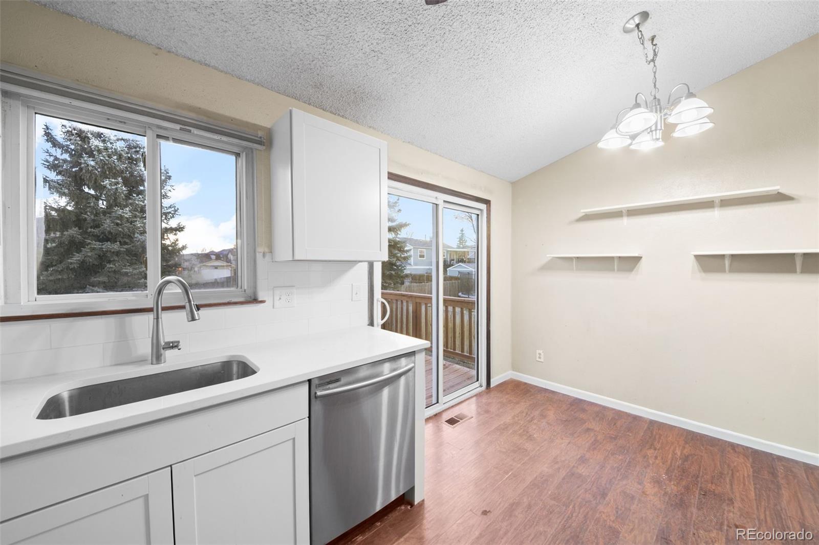 10966 W Bowles Place