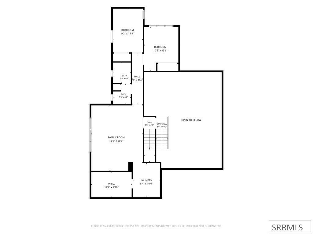 Upper-level floor plan with two bedrooms, family room, laundry, walk-in closet, and an open-to-below area.