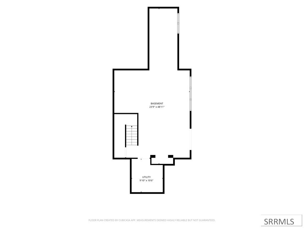 Basement floor plan with stairs and a separate utility room.