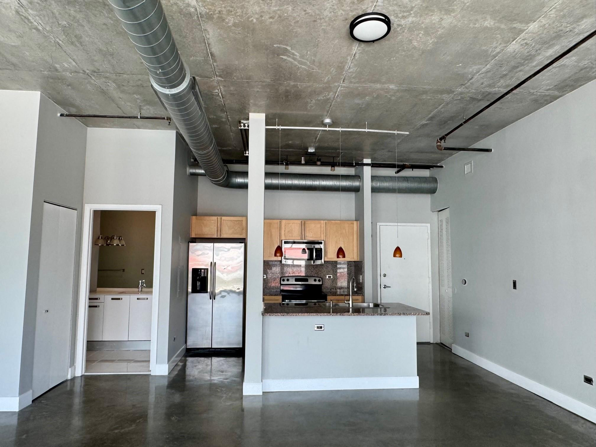 313 NE 2ND ST 703