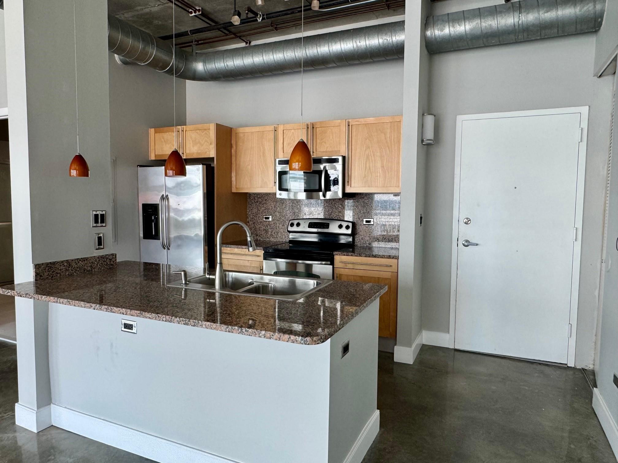 313 NE 2ND ST 703