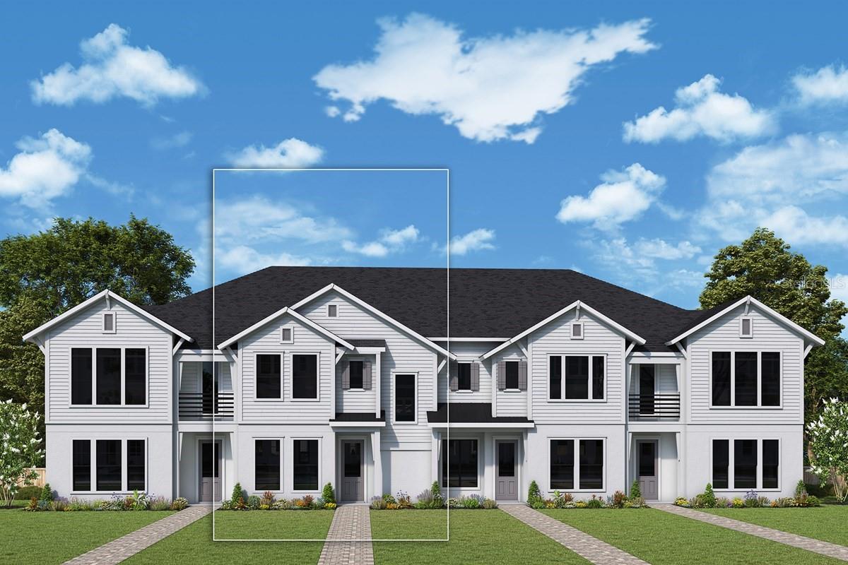 White two-story townhomes with dark roofs and landscaped front lawns; one central unit is outlined.