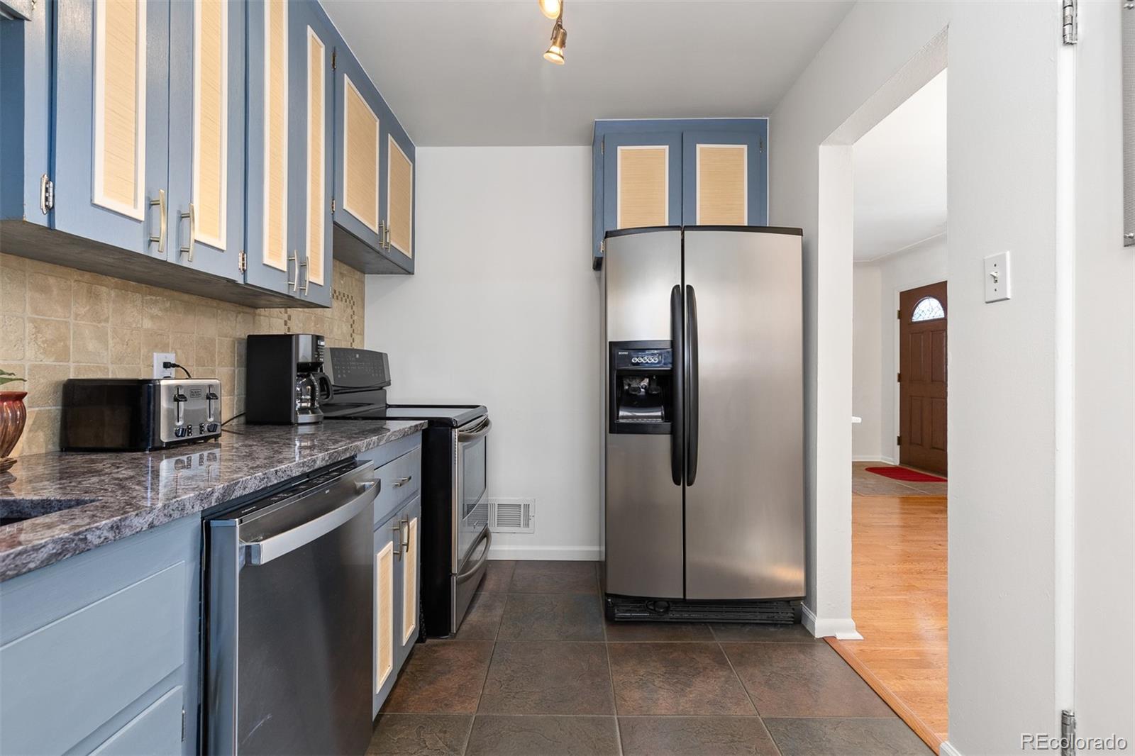 2434 S Ogden Street Unit: 2434-2436