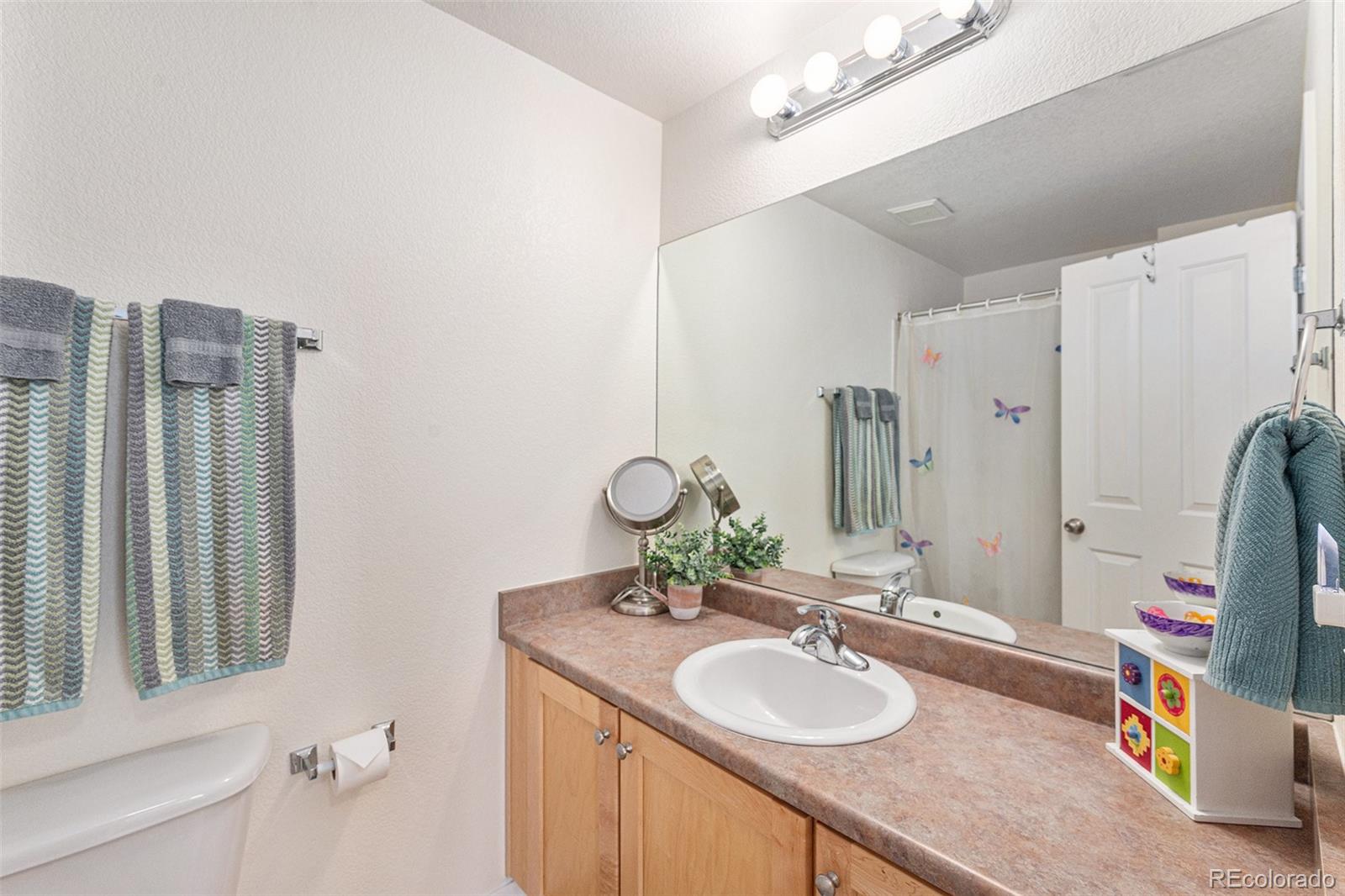 8808 S Kipling Way Unit: E 202