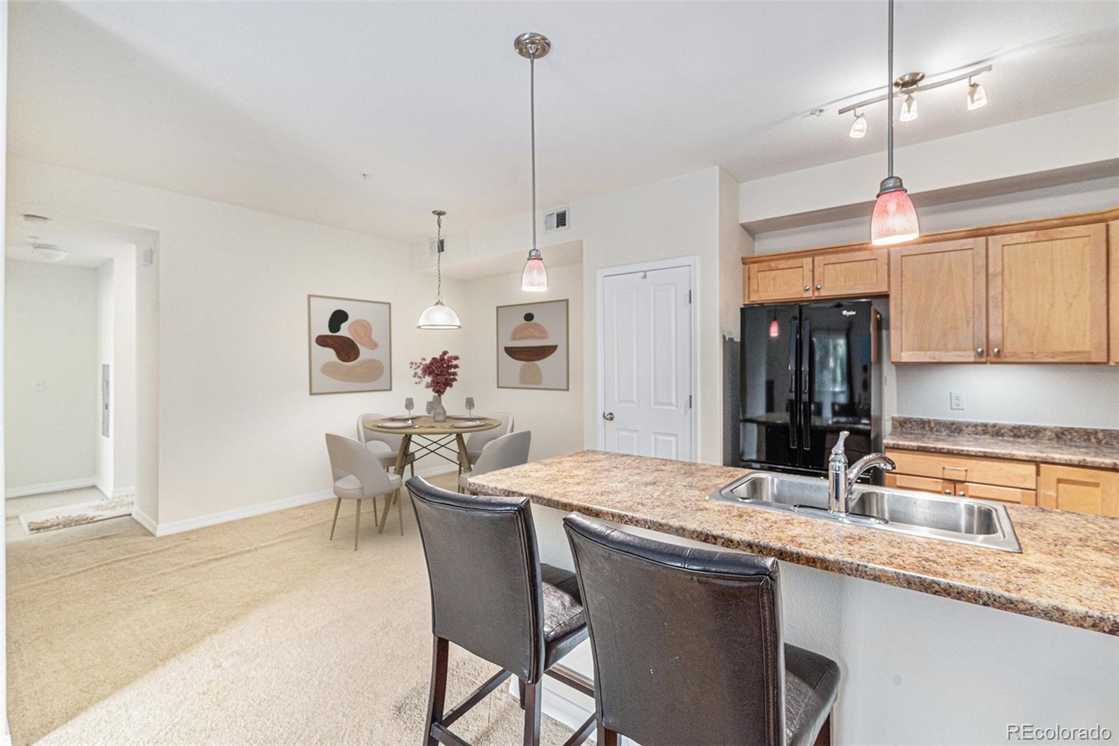 8808 S Kipling Way Unit: E 202