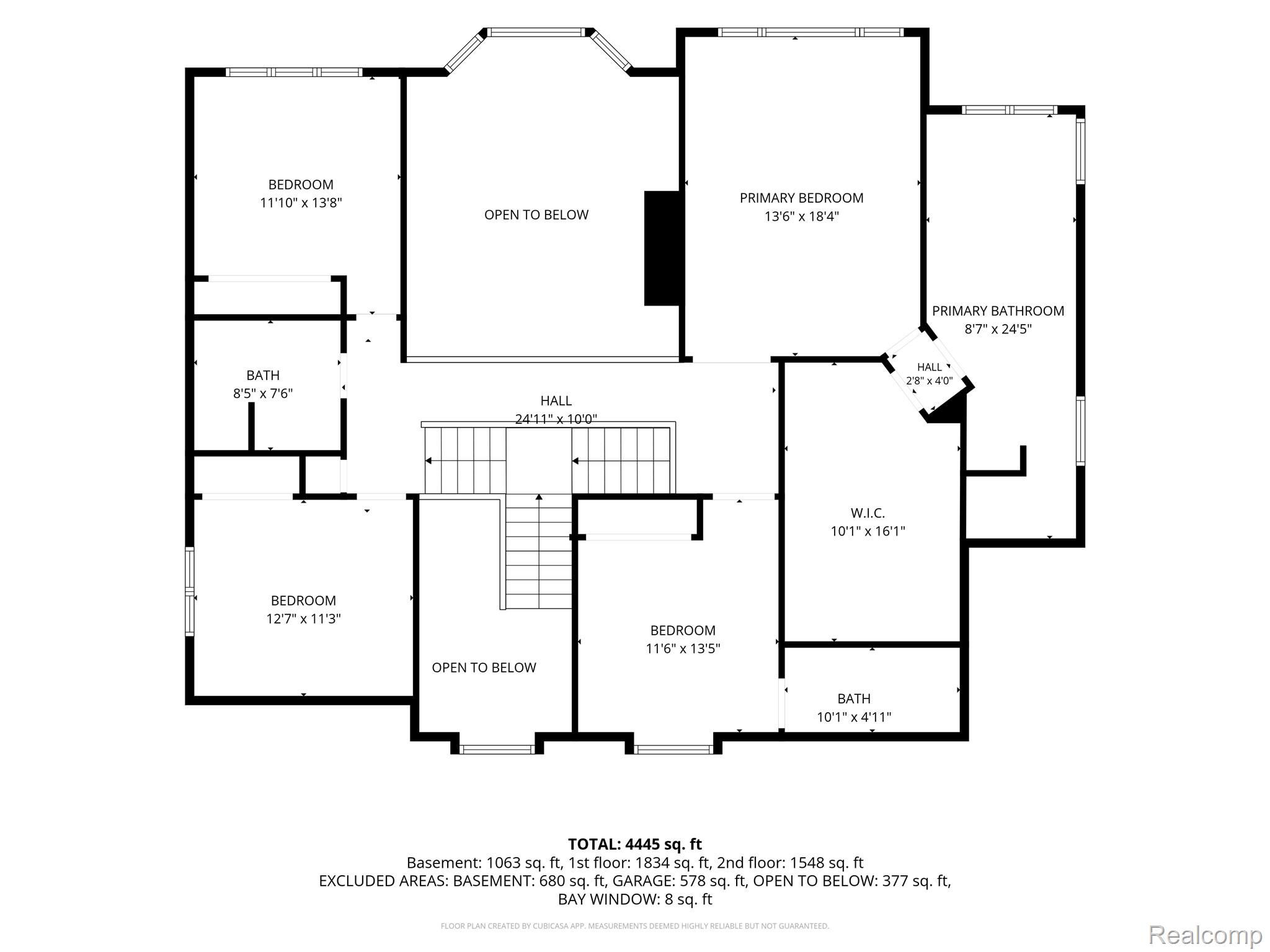 Second-floor plan with three bedrooms, a primary suite, two bathrooms, a walk-in closet, and open-to-below areas.