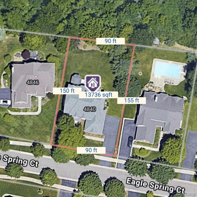 Aerial view of 4840 Eagle Springs Court, with the lot outlined in red and dimensions labeled.