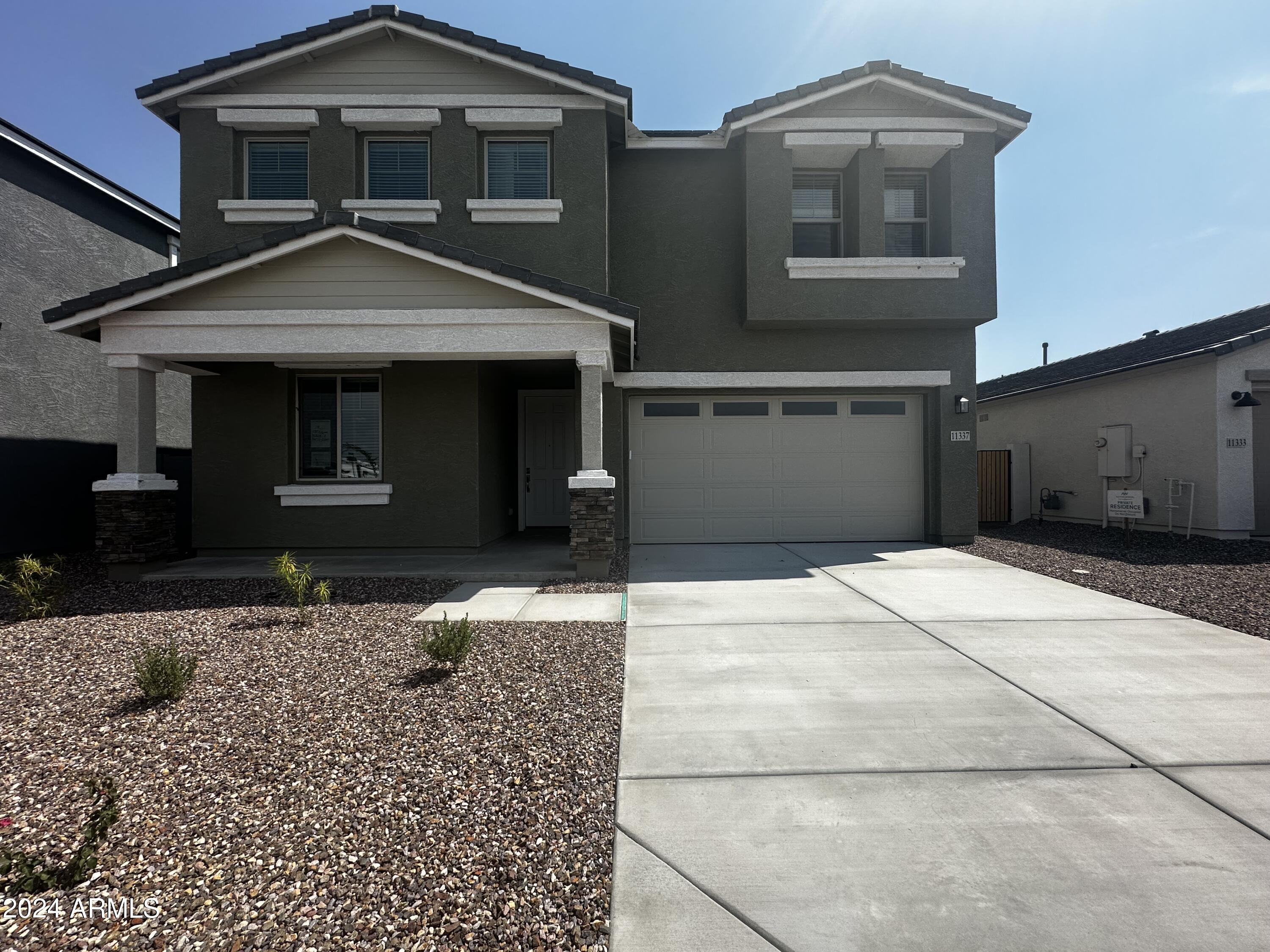 11337 E ULYSSES Avenue