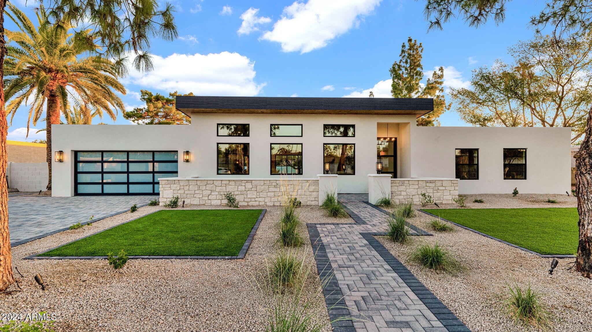 5911 E VOLTAIRE Avenue