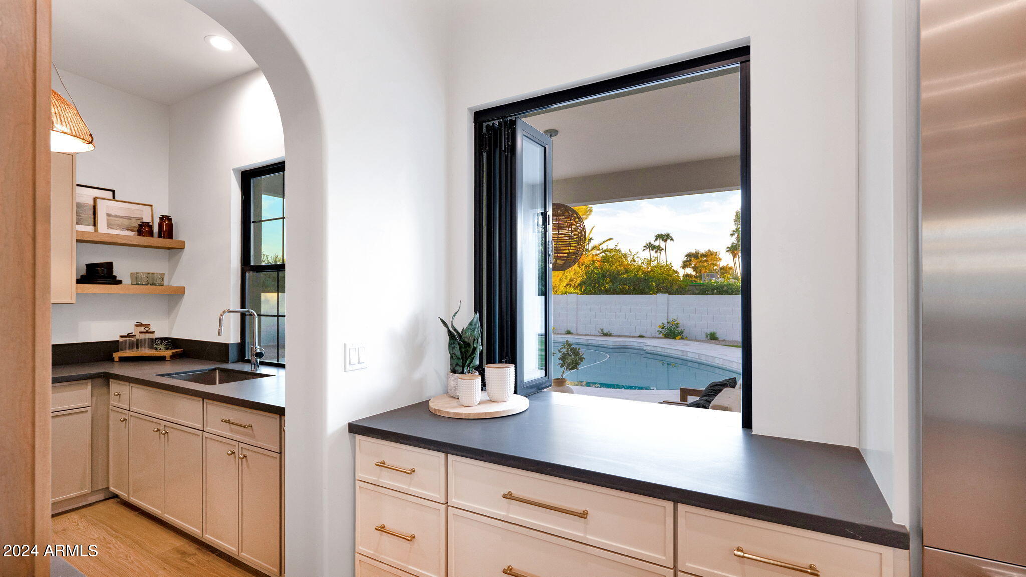 5911 E VOLTAIRE Avenue