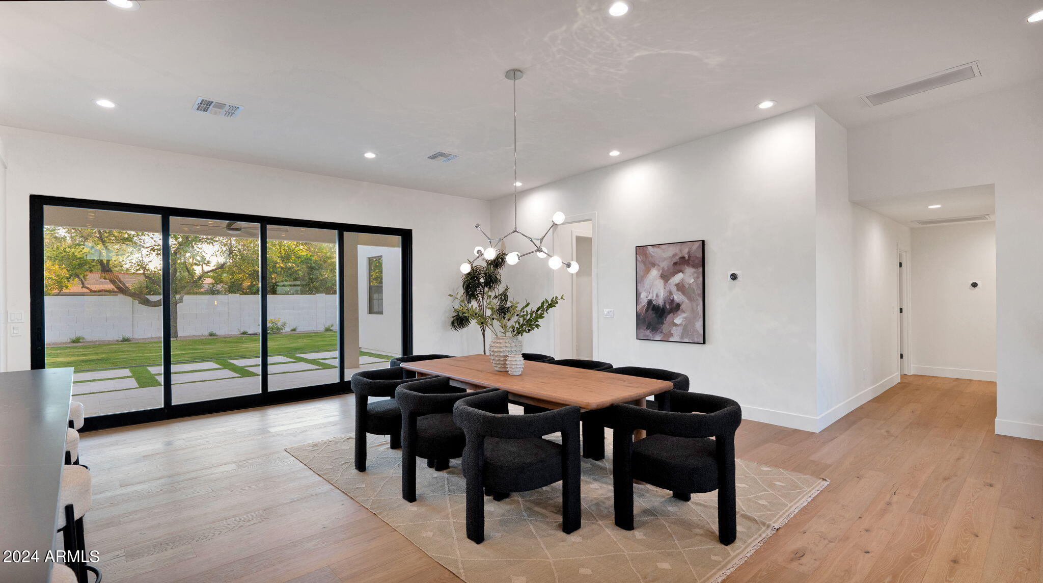 5911 E VOLTAIRE Avenue