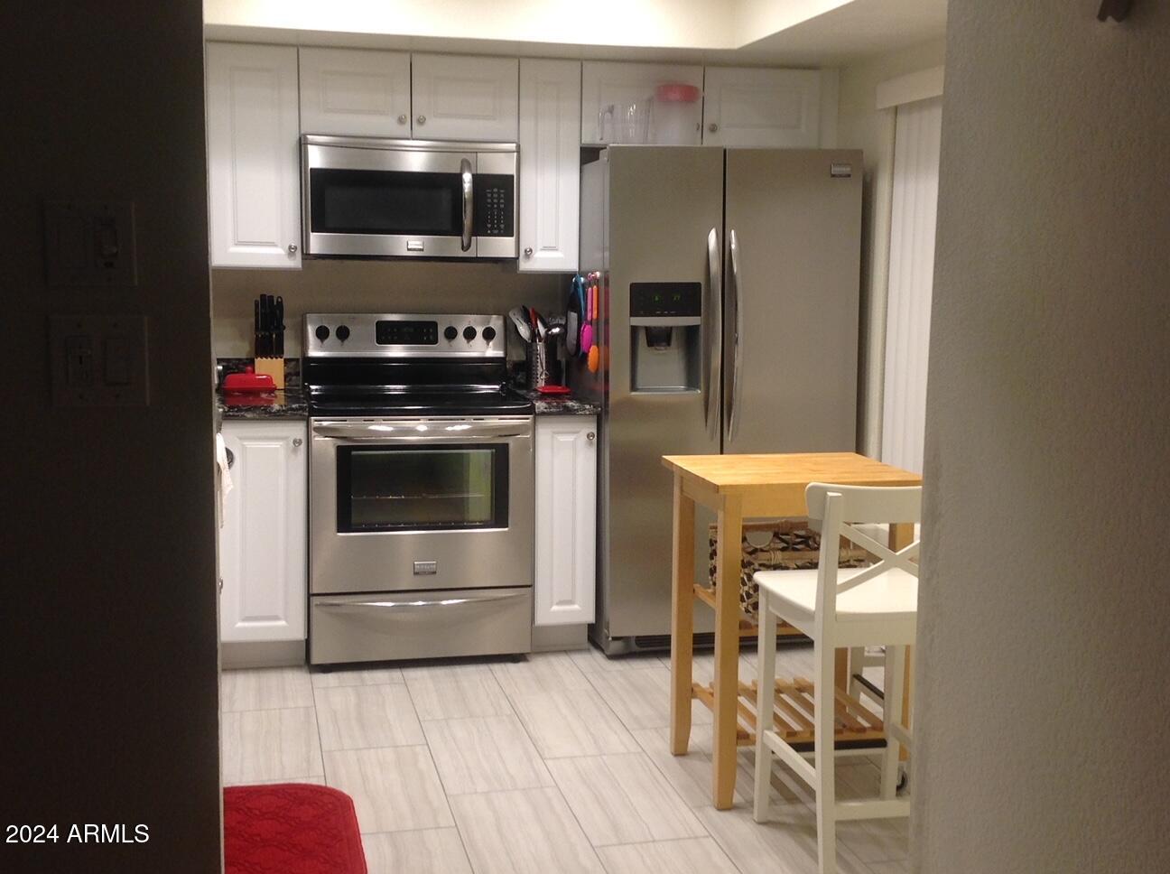 9450 N 94TH Place # 210