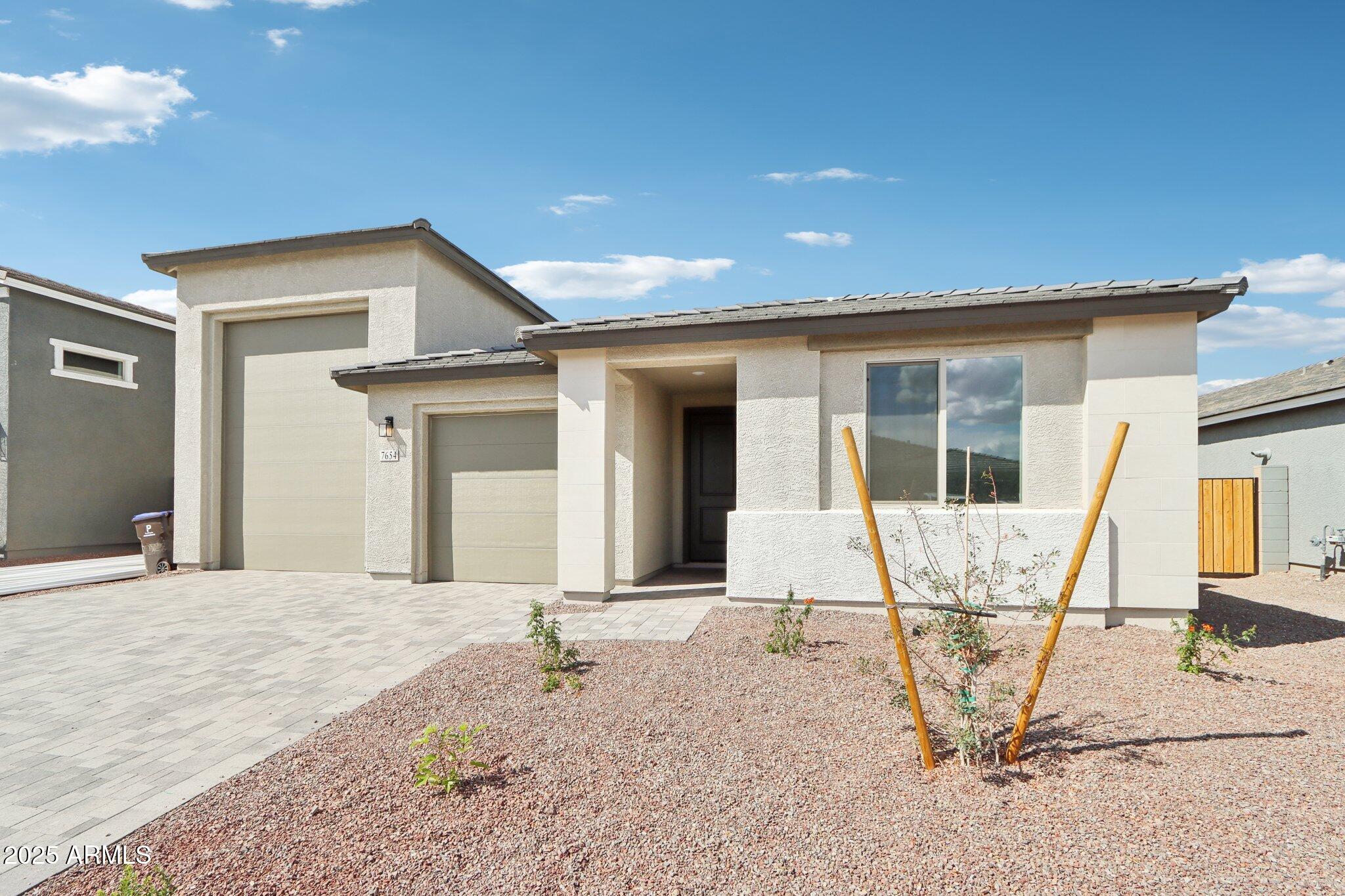 7654 W TETHER Trail
