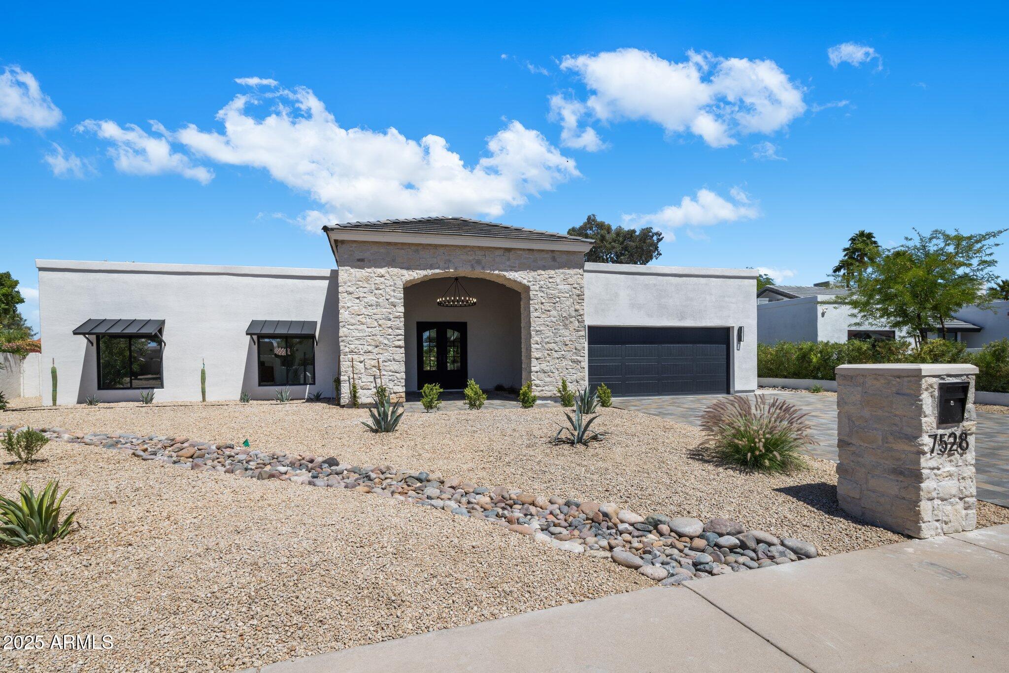 7528 E WINDROSE Drive