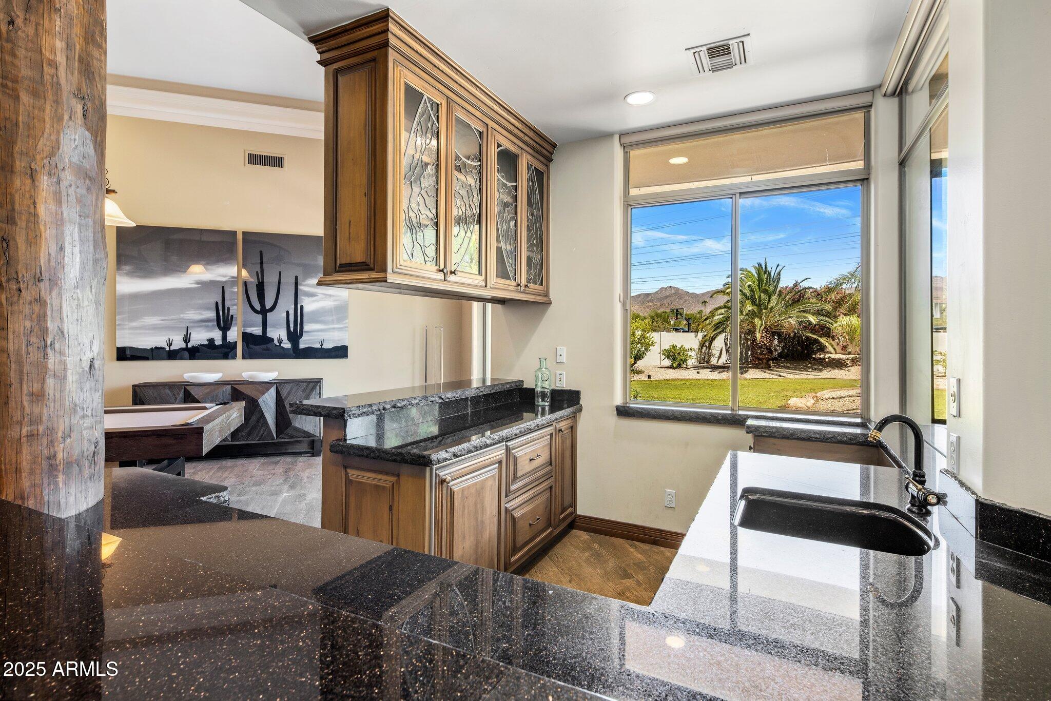 11717 E ESTRELLA Avenue