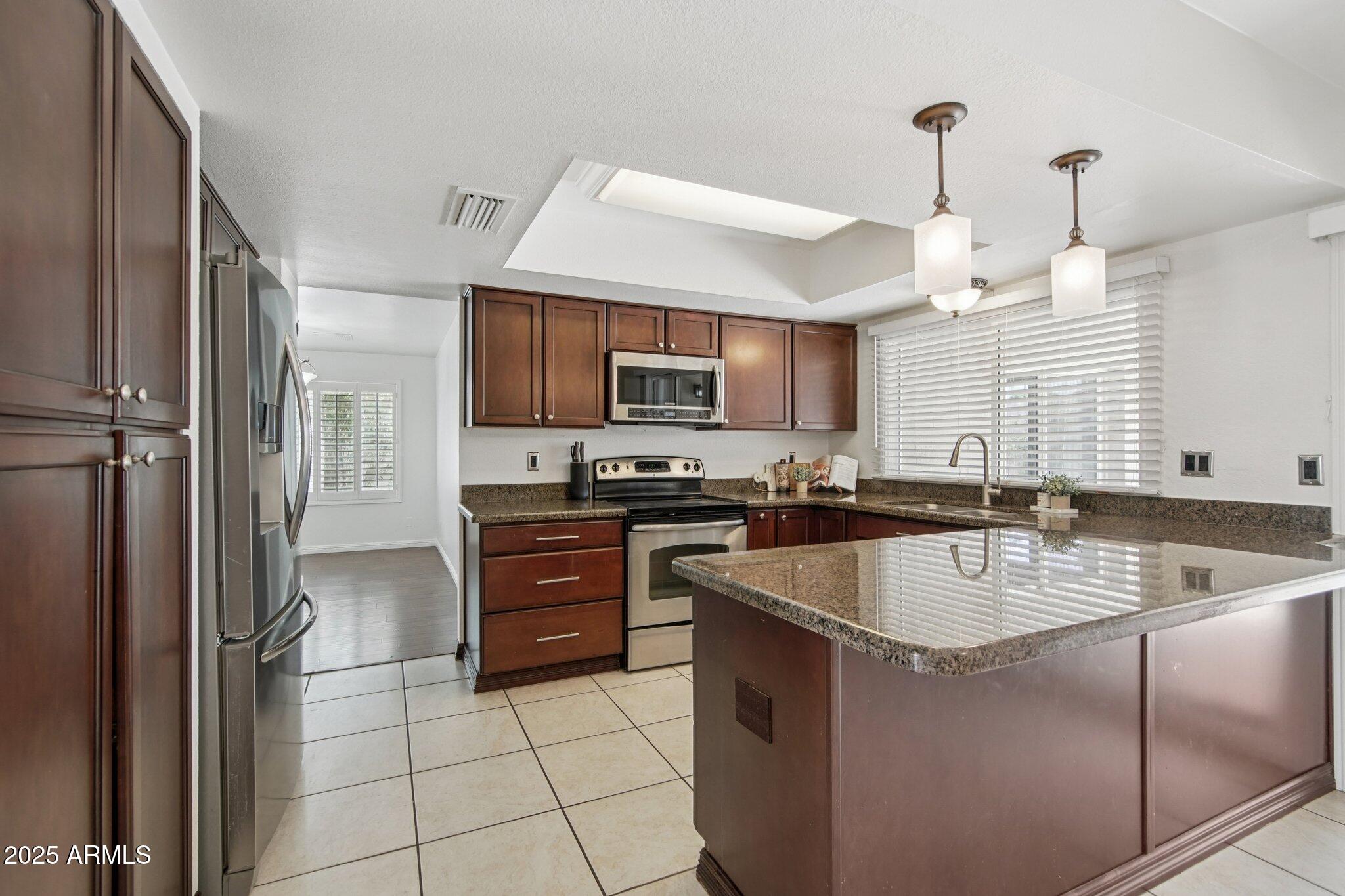 1261 W KILAREA Avenue