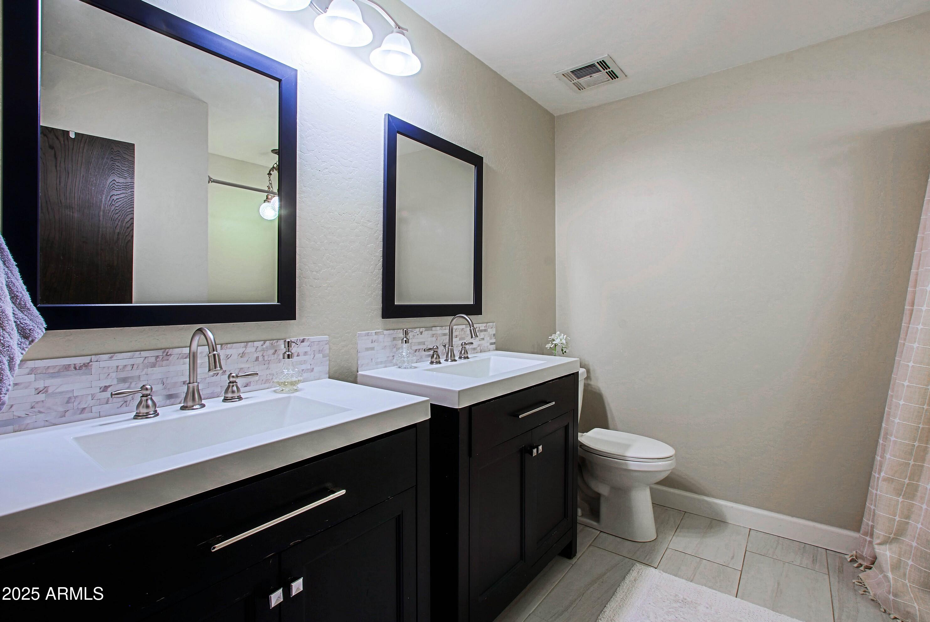 4901 W SOFT WIND Drive