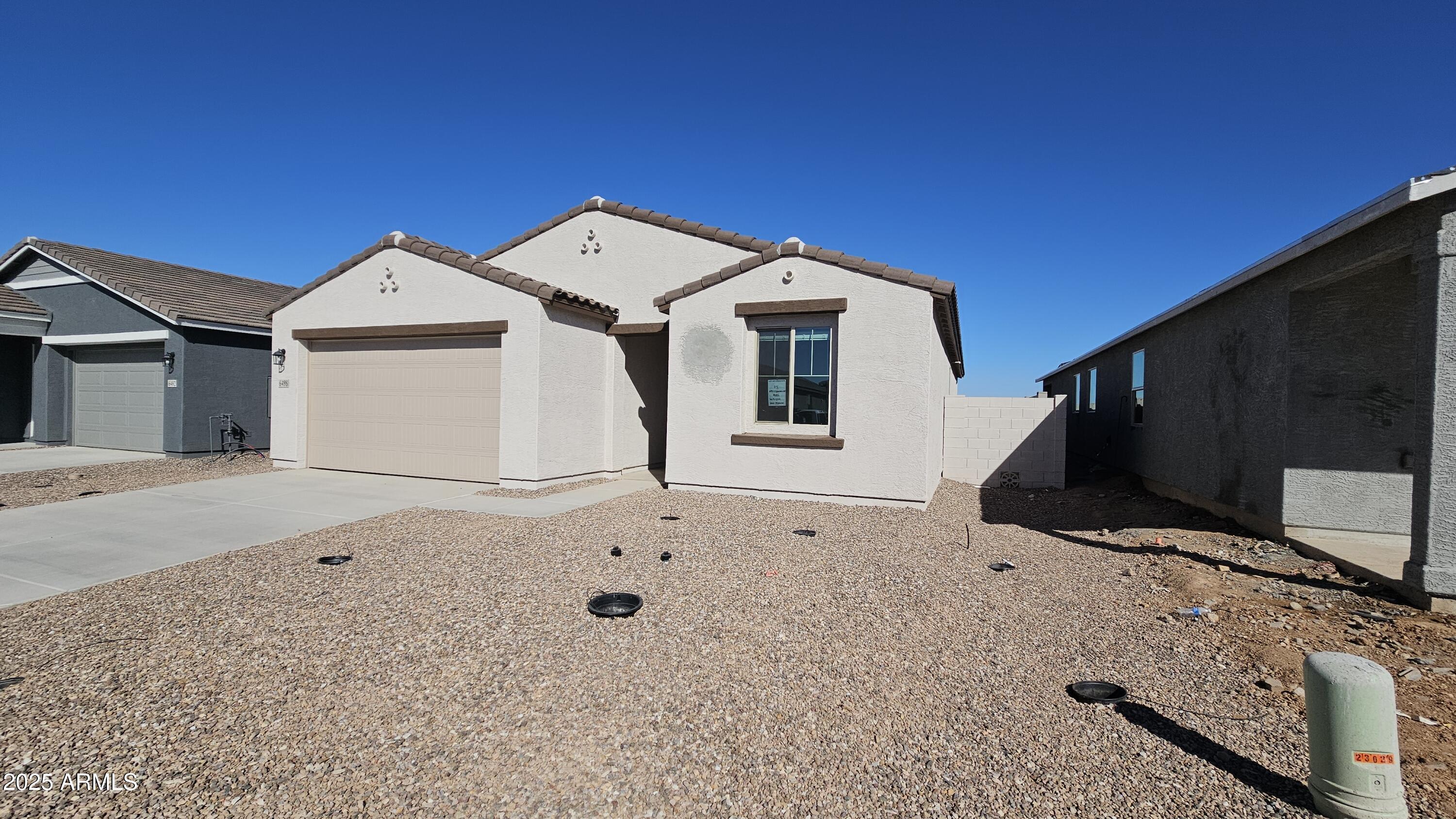 6498 E FIDDLENECK Way