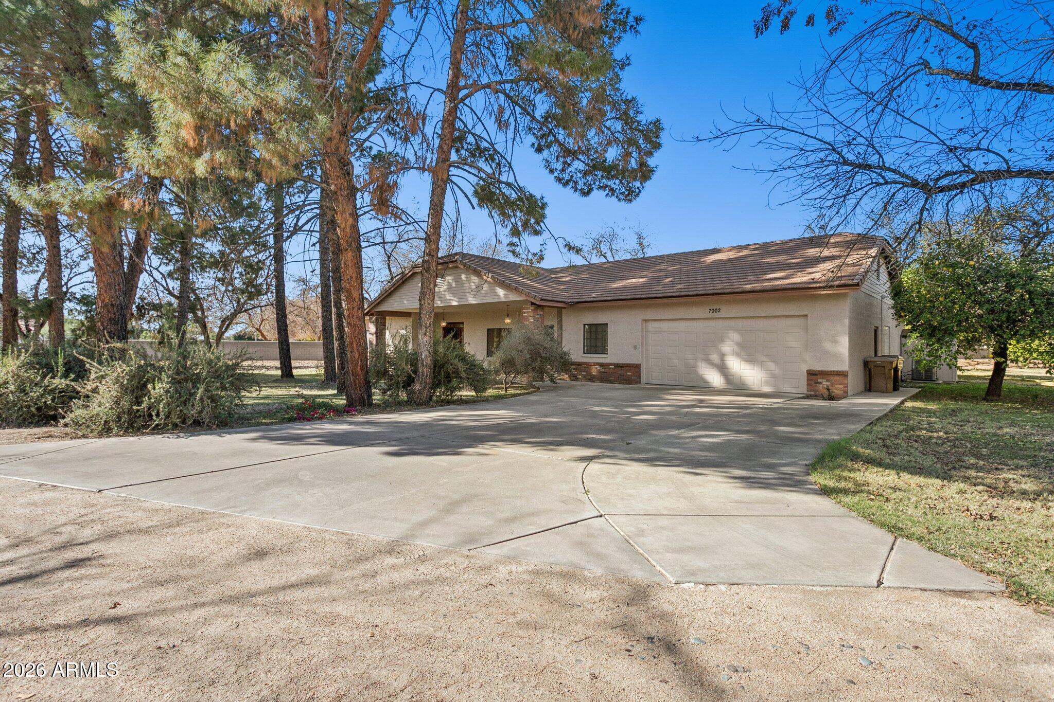 7002 W Surrey Avenue