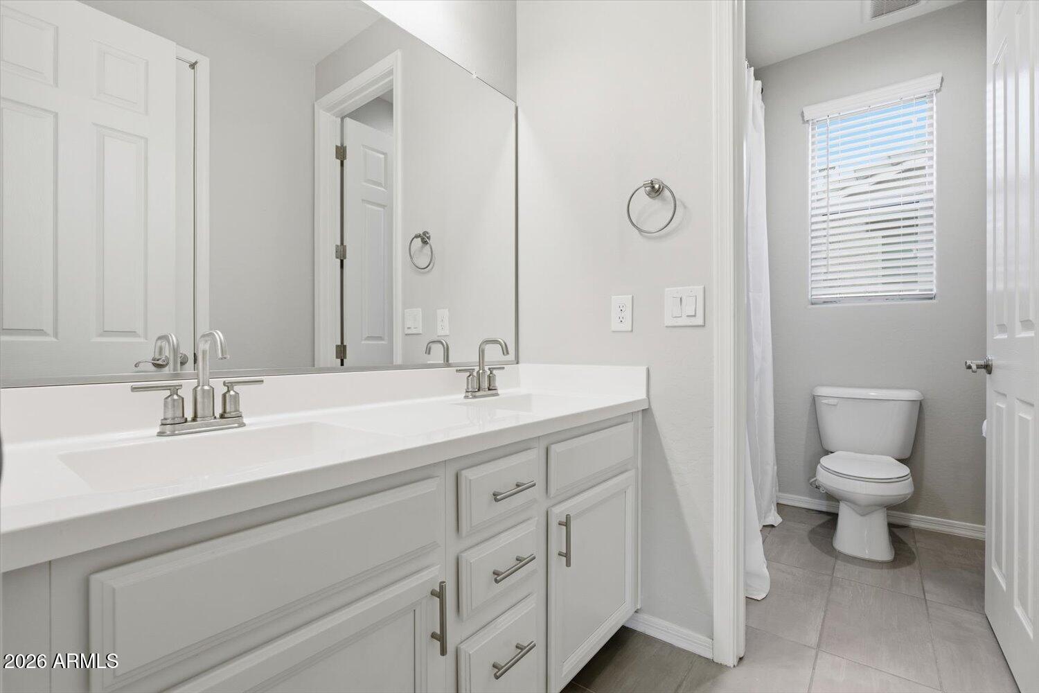 14330 W VOLTAIRE Street