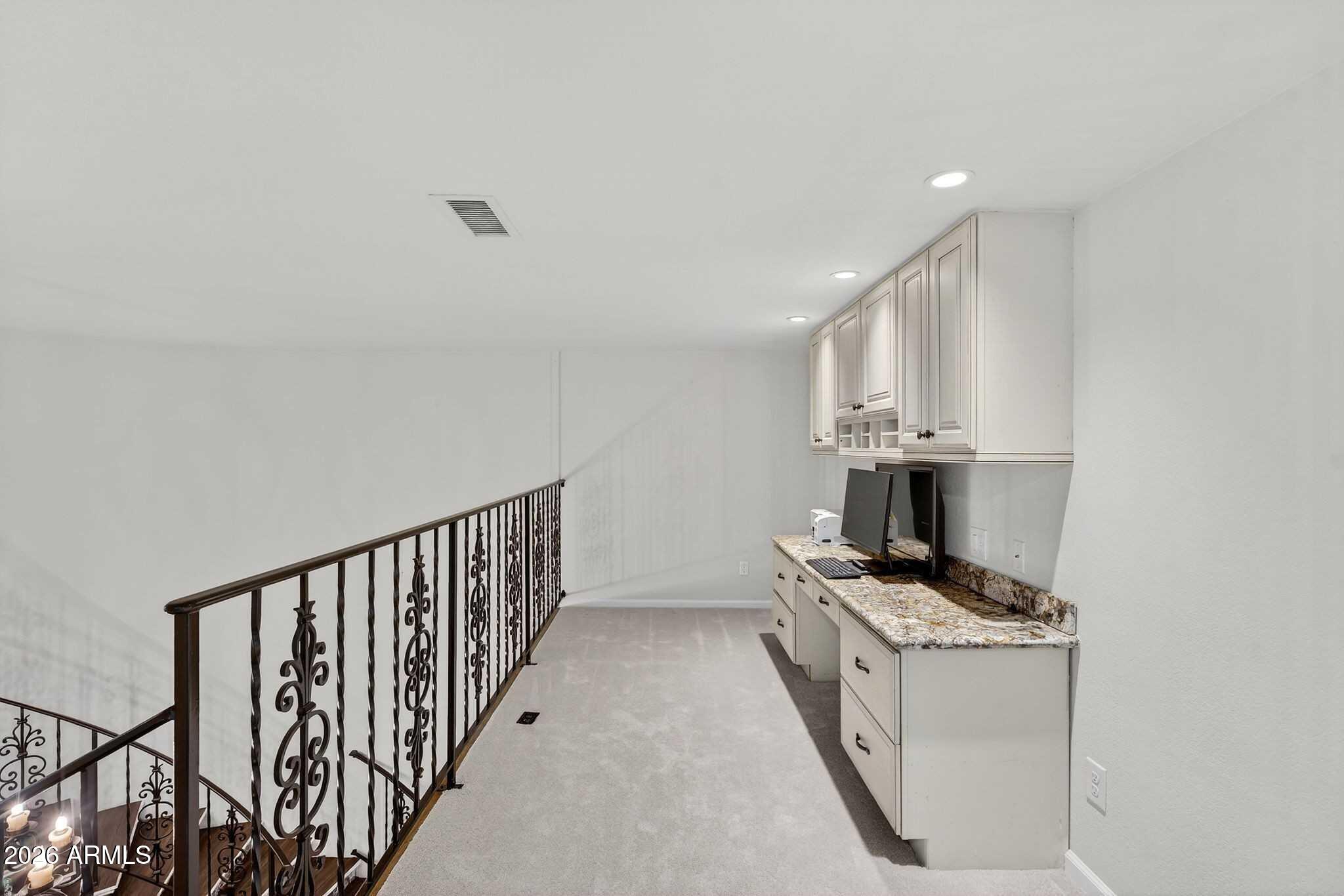 77 E MISSOURI Avenue 27