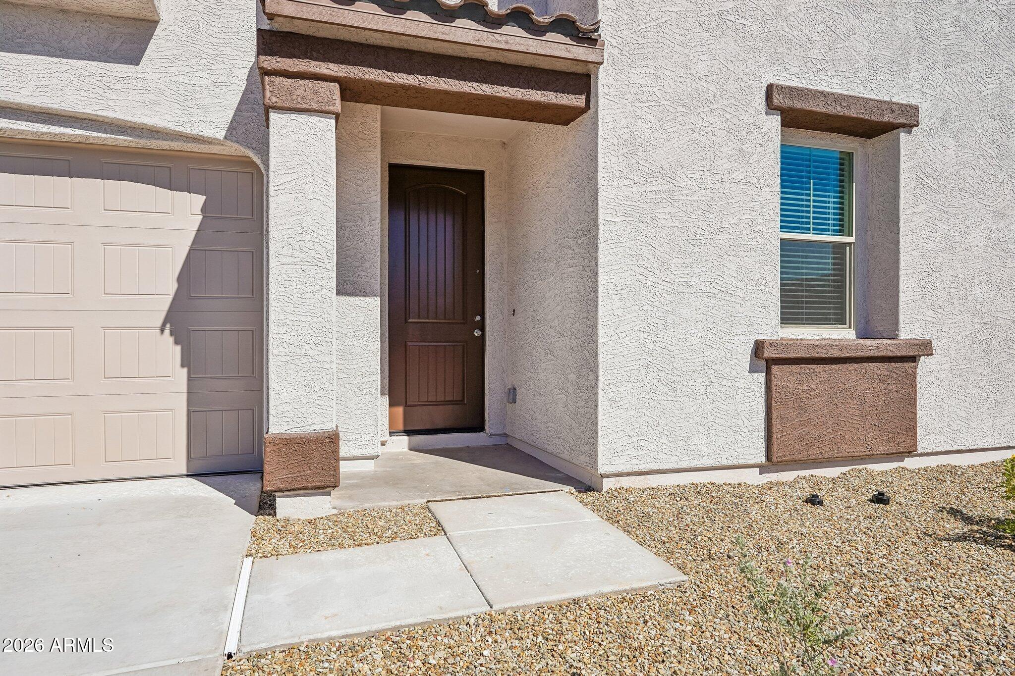9644 W TAMARISK Avenue