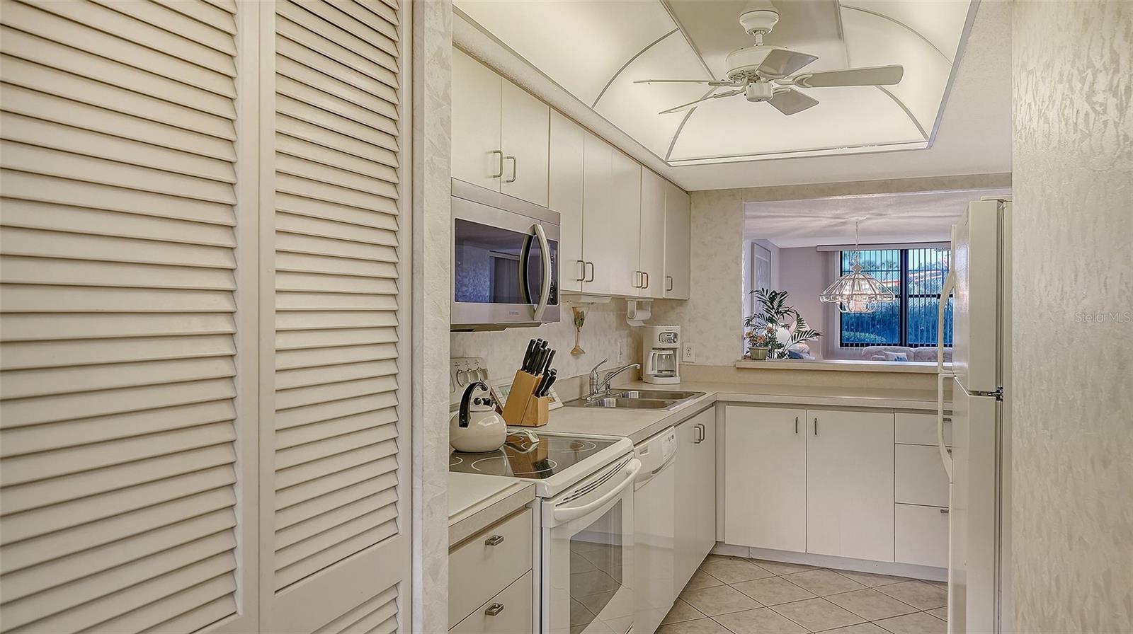 8773 MIDNIGHT PASS RD #102G