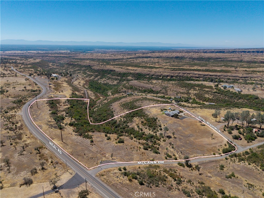 Aerial view of vacant land outlined along Neal Road, McCann Drive, and Royal Meadow Lane.