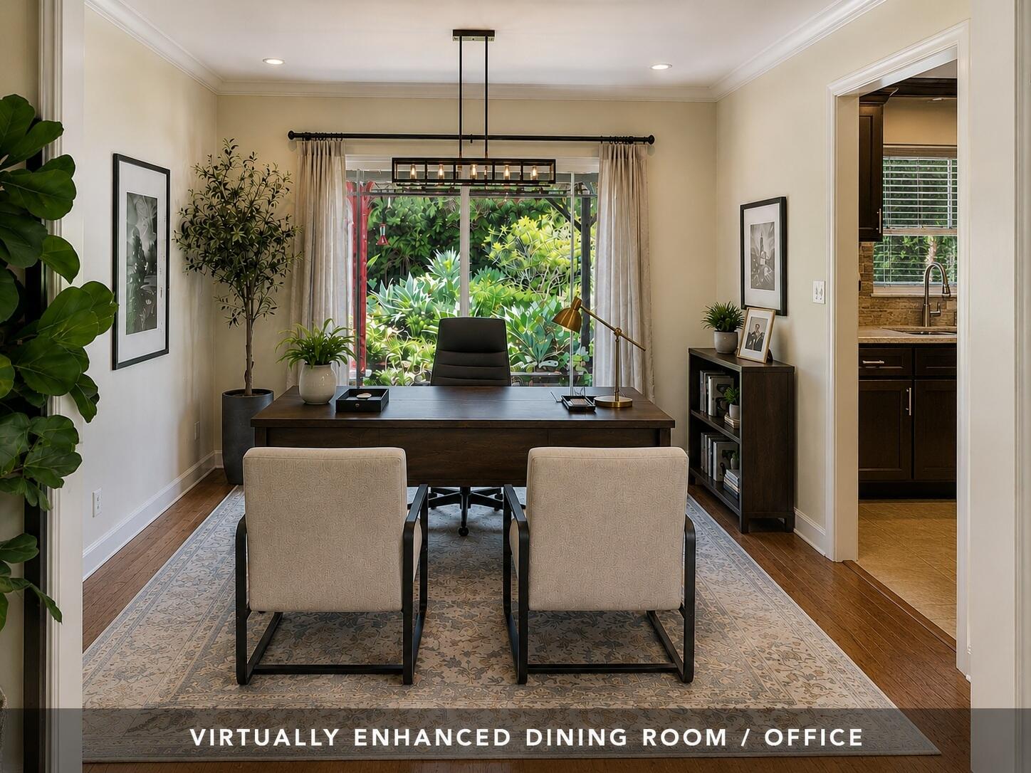 Furnished dining room office with a dark desk, two chairs, and a large garden-facing window.