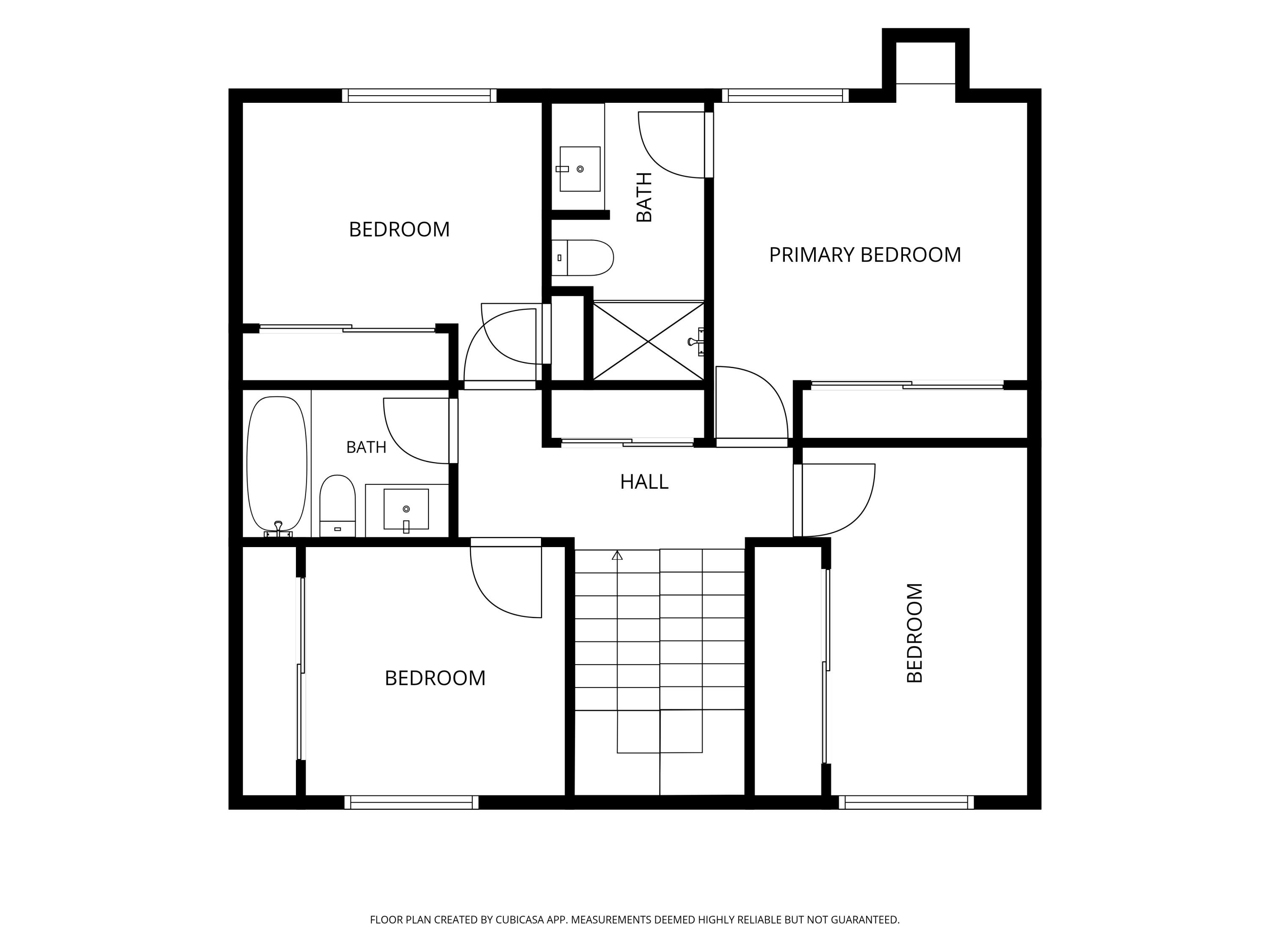 Floor plan of a three-bedroom home with two bathrooms, a central hall, and stairs.